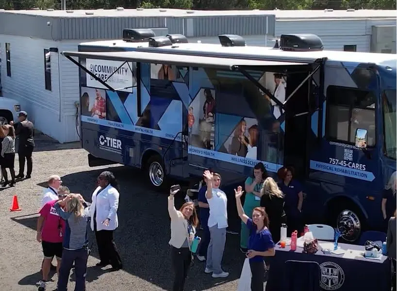 A community health event around a mobile clinic at a school